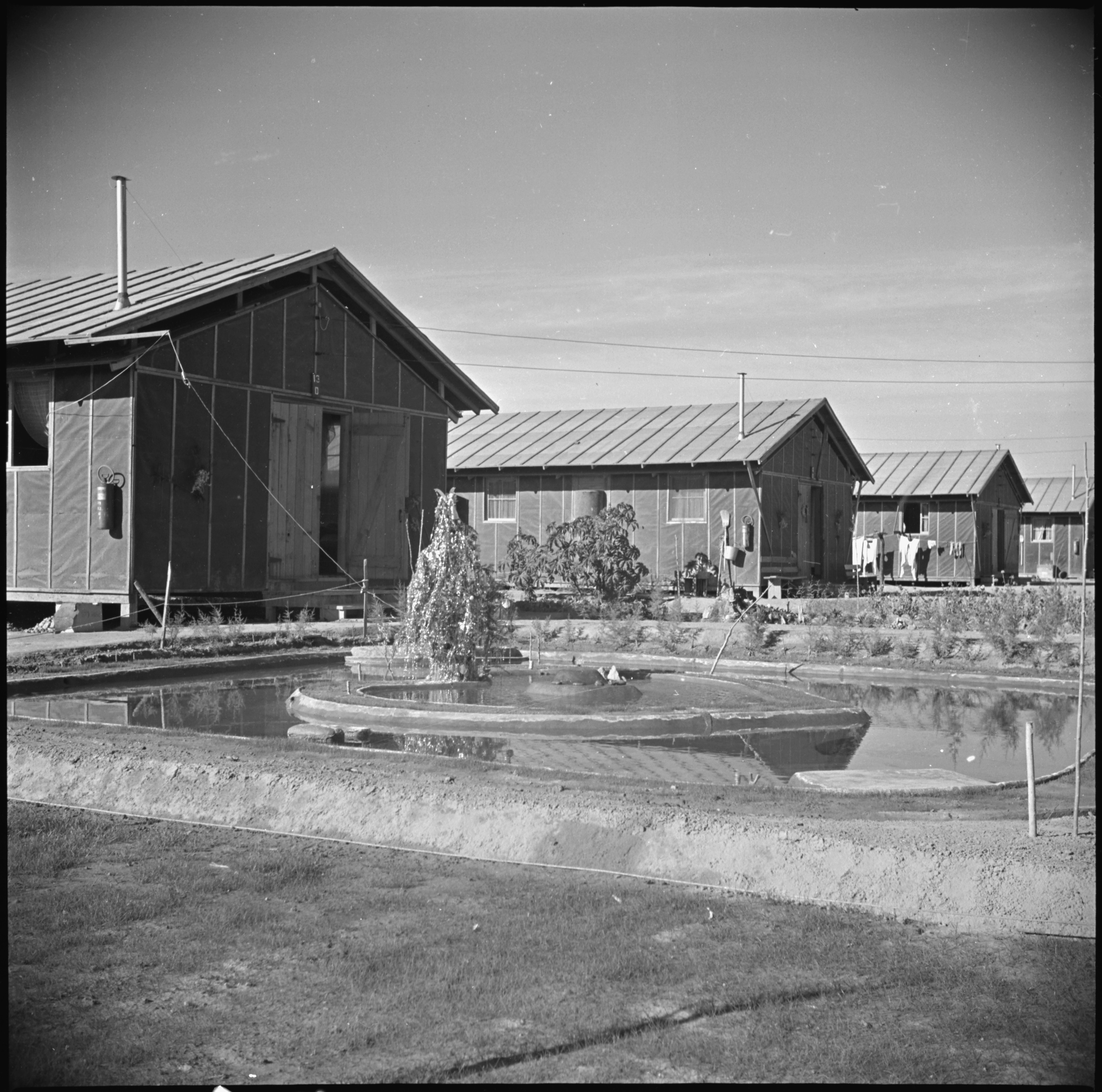  "Poston, Arizona. Landscaping done by residents of Camp Number 1." December 31, 1942. Francis Stewart, War Relocation Authority Photographer, Department of the Interior, War Relocation Authority. Public Domain.